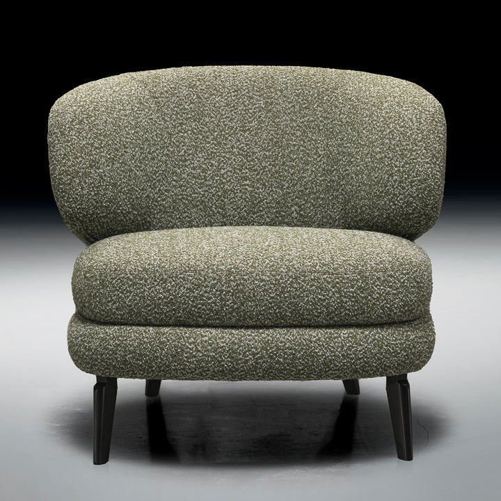 Modern boucle fabric 1 seater sofa moss in close up details.