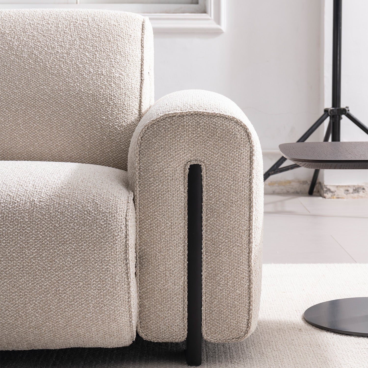 Minimalist boucle fabric modular 3 seater sofa colle in panoramic view.