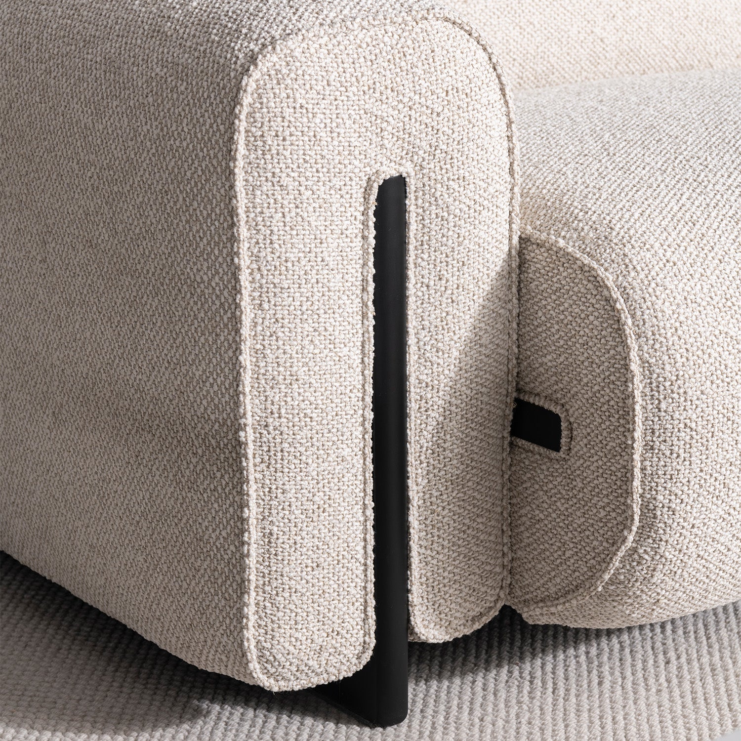 Minimalist boucle fabric modular 3 seater sofa colle in still life.
