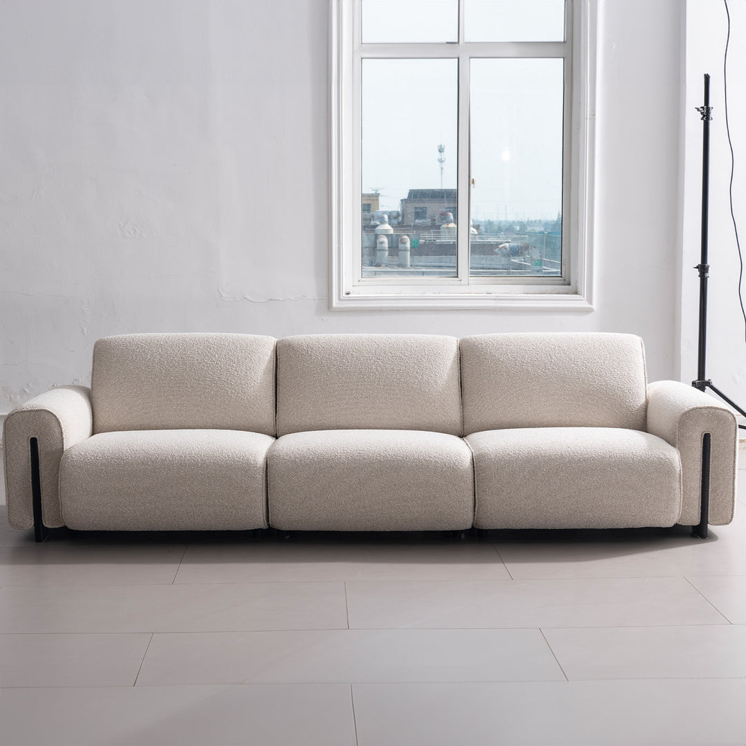 Modern boucle fabric modular 4 seater sofa colle with context.