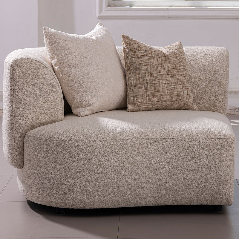 Modern boucle fabric modular corner 1 seater sofa rene in panoramic view.