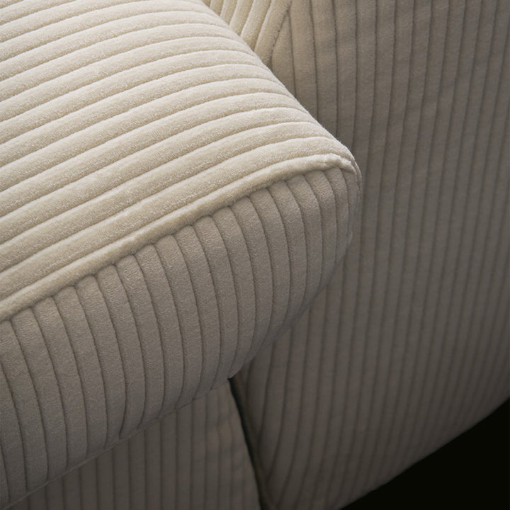 Modern corduroy velvet fabric modular corner 1 seater sofa ernest in close up details.