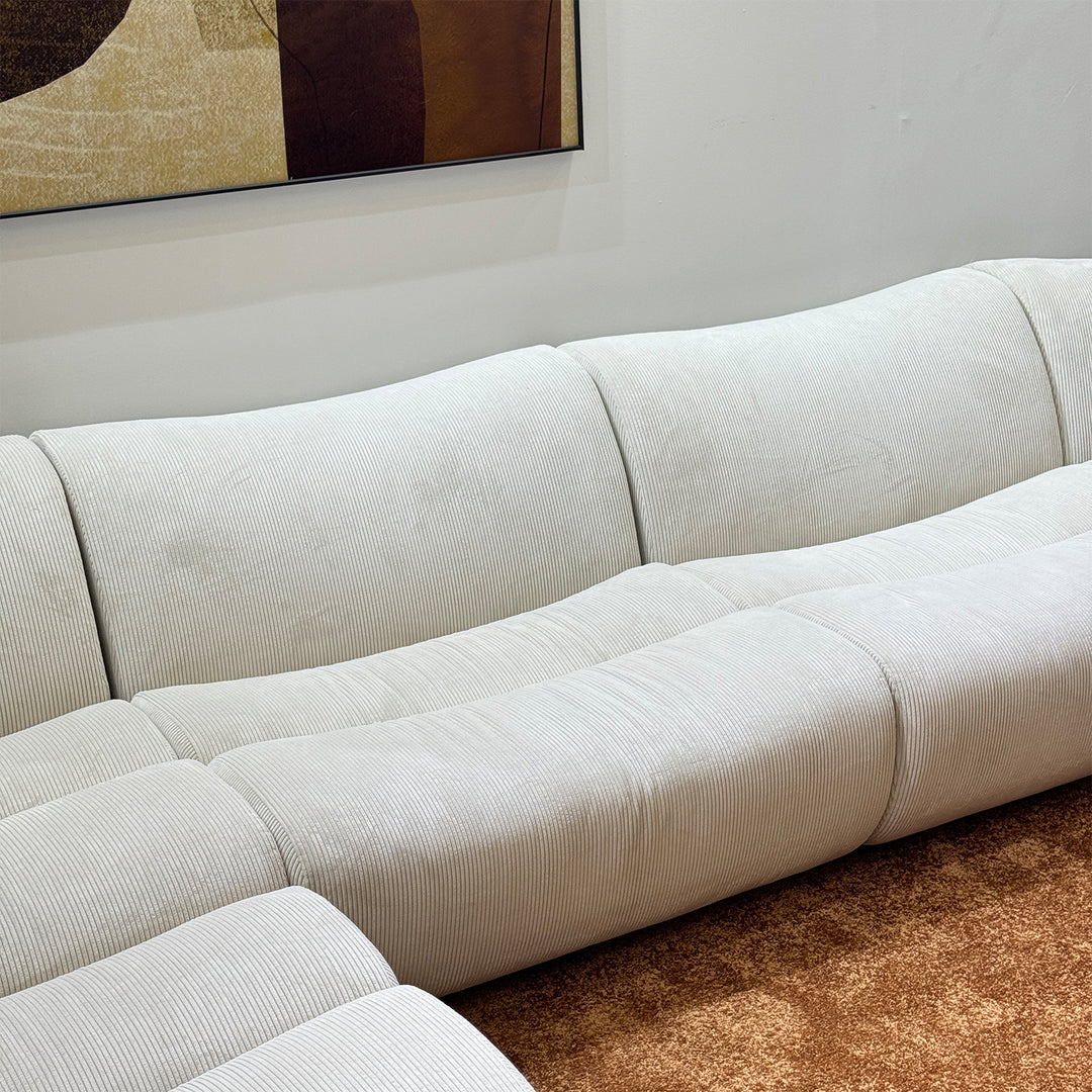 Modern corduroy velvet fabric modular l shape sectional sofa ernest 4+l in panoramic view.