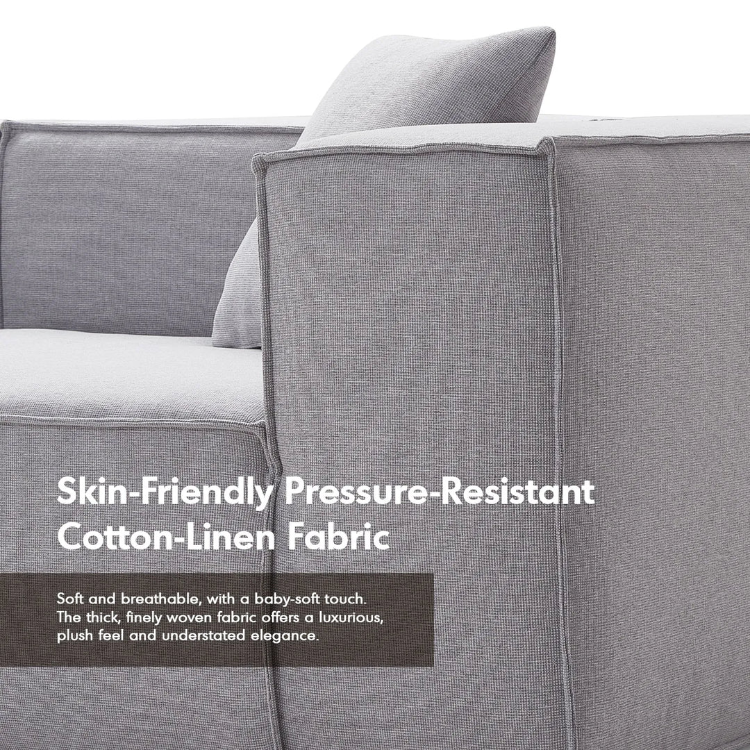 Modern cotton-linen fabric 4.5 seater sofa block in close up details.