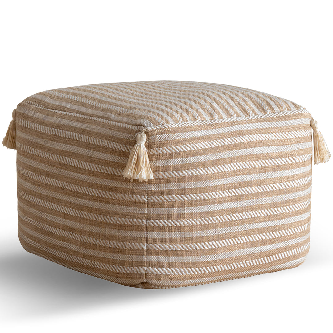 Modern mixed weave fabric ottoman beanie in white background.