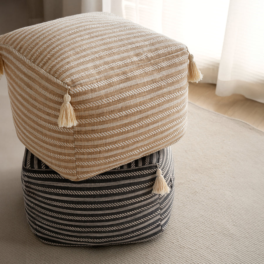 Modern mixed weave fabric ottoman beanie primary product view.