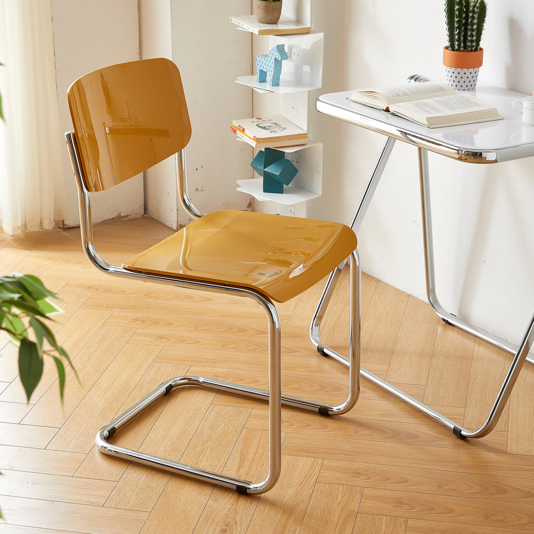 Contemporary plastic dining chair zoom primary product view.