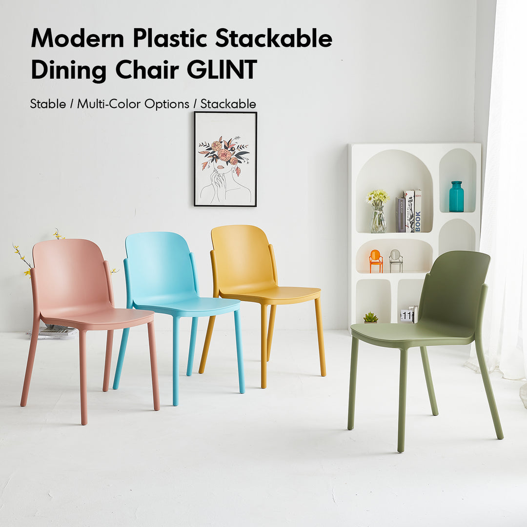 Contemporary plastic stackable dining chair glint material variants.