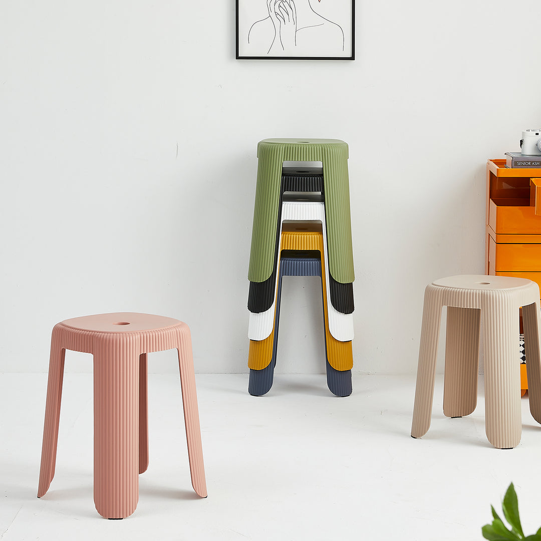 Contemporary plastic stackable dining stool pop layered structure.