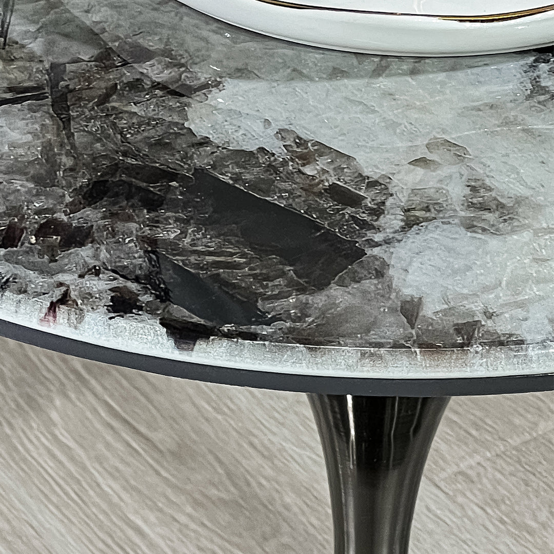 Modern sintered stone side table twist with context.