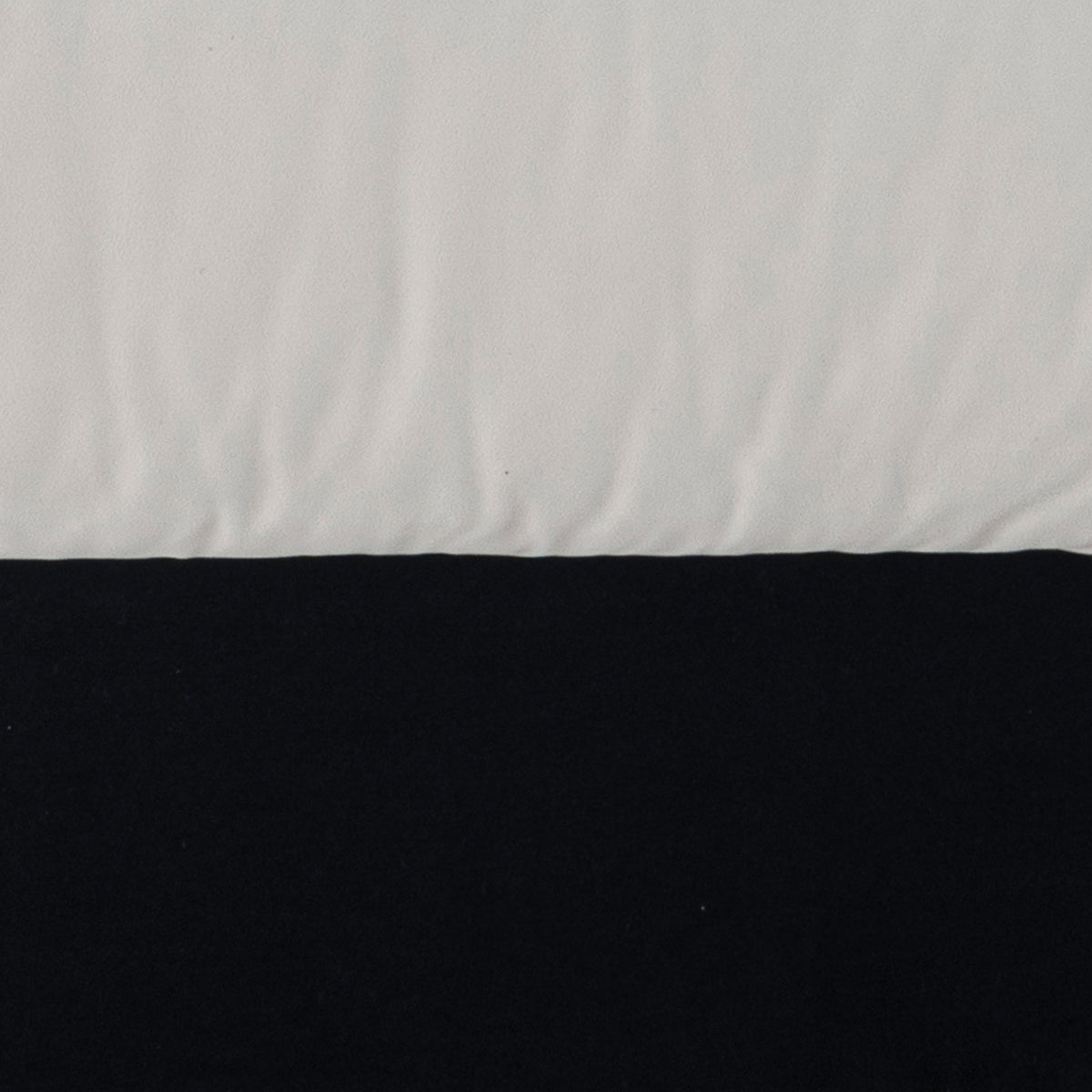 Cream suede fabric armless 1 seater sofa camellia in close up details.