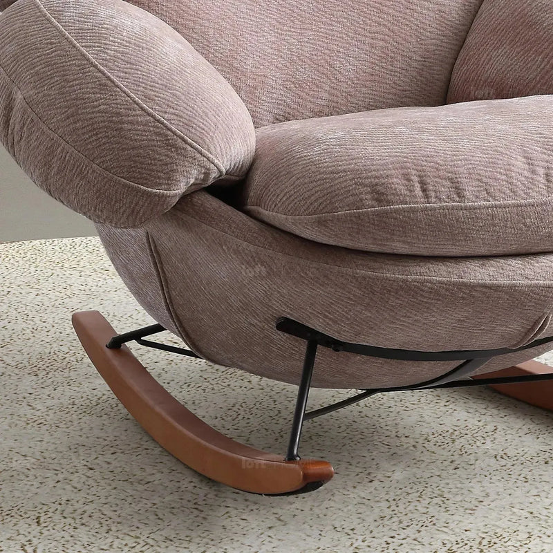 Cream teddy fabric rocking 1 seater sofa swank in close up details.