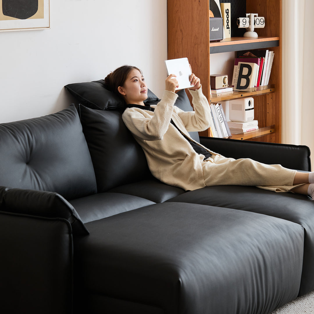 Modern genuine leather electric recliner 4 seater sofa evena with context.
