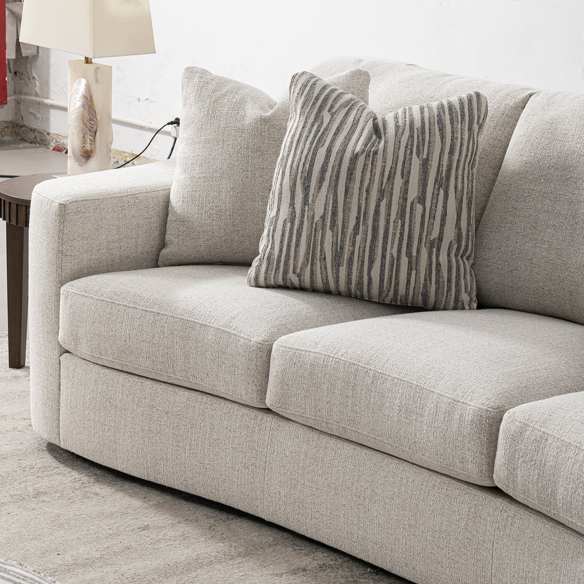 Modern mixed weave fabric 4 seater sofa terra with context.