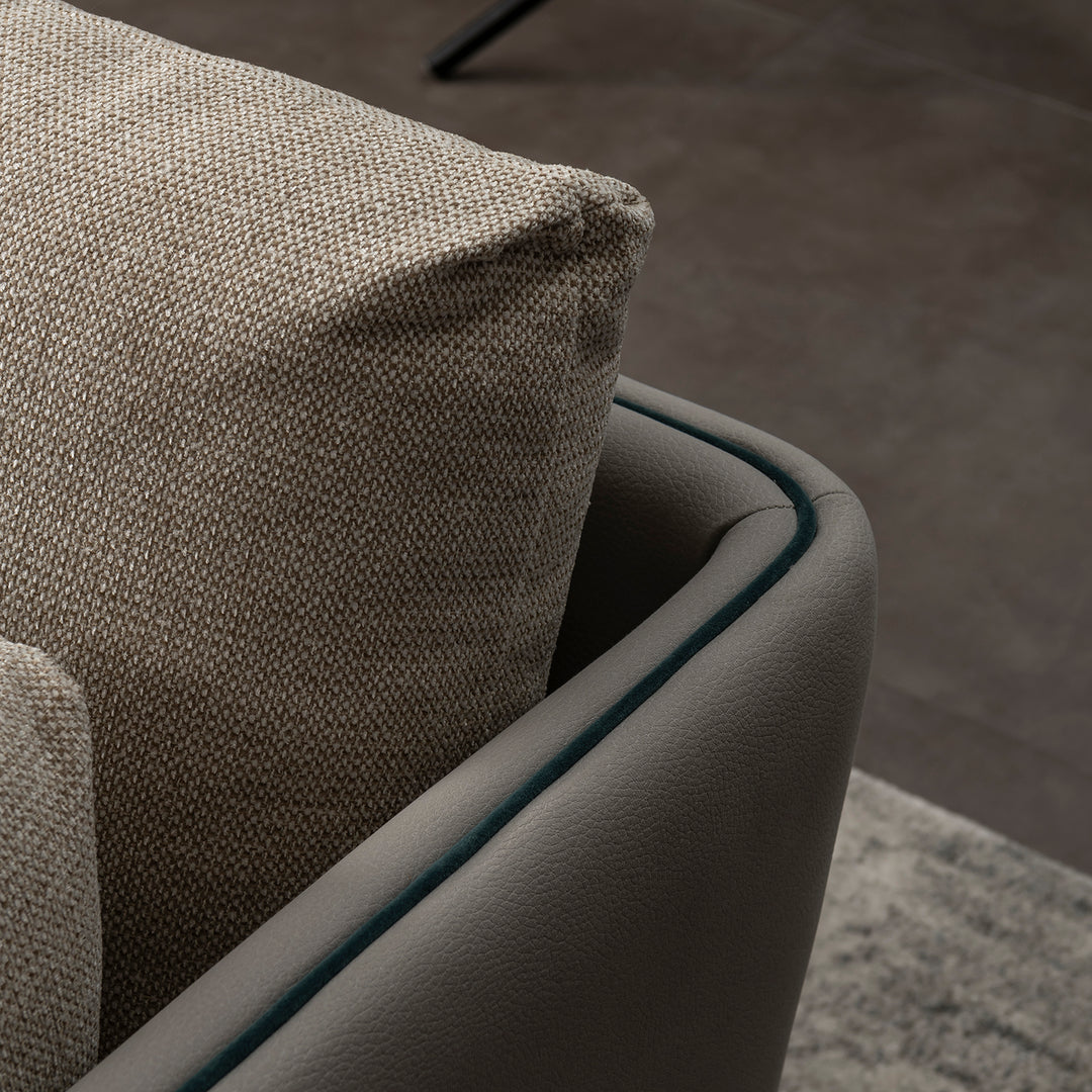 Modern mixed weave fabric microfiber leather 3 seater sofa vanta in close up details.