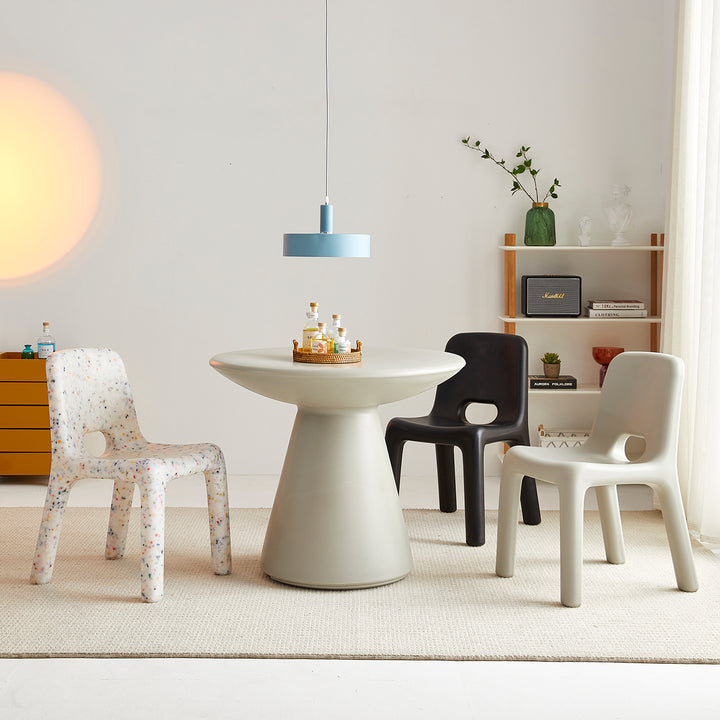 Modern plastic dining chair poky with context.