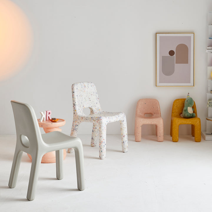 Modern plastic dining chair poky in close up details.