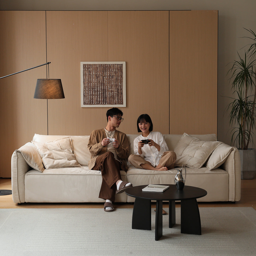 Modern suede fabric sectional 3 seater sofa looma in still life.