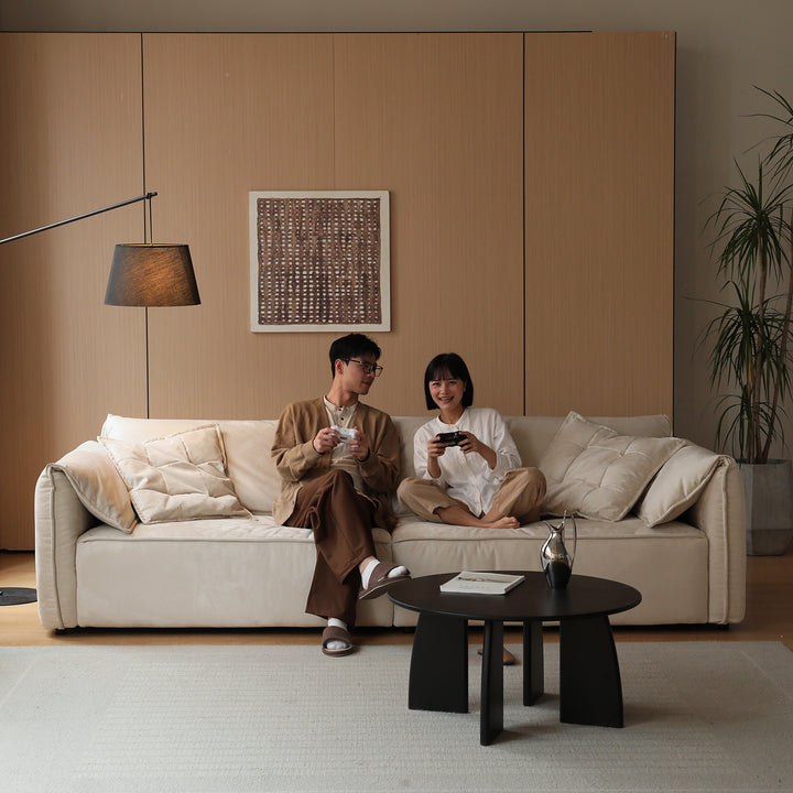 Modern suede fabric sectional 3 seater sofa looma in still life.