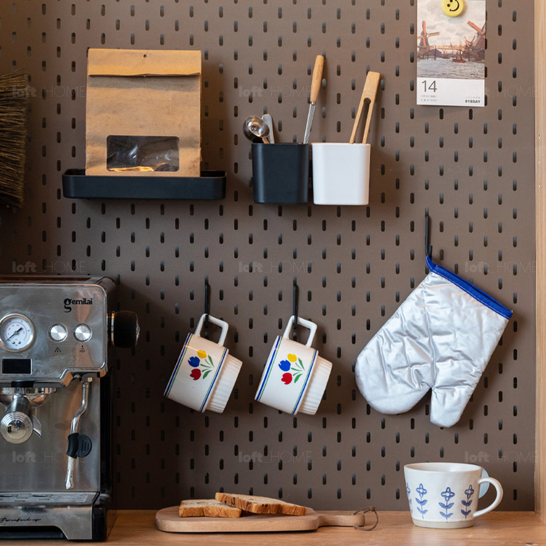 Pegboard hooks racks storage boxes accessories set hookup in real life style.