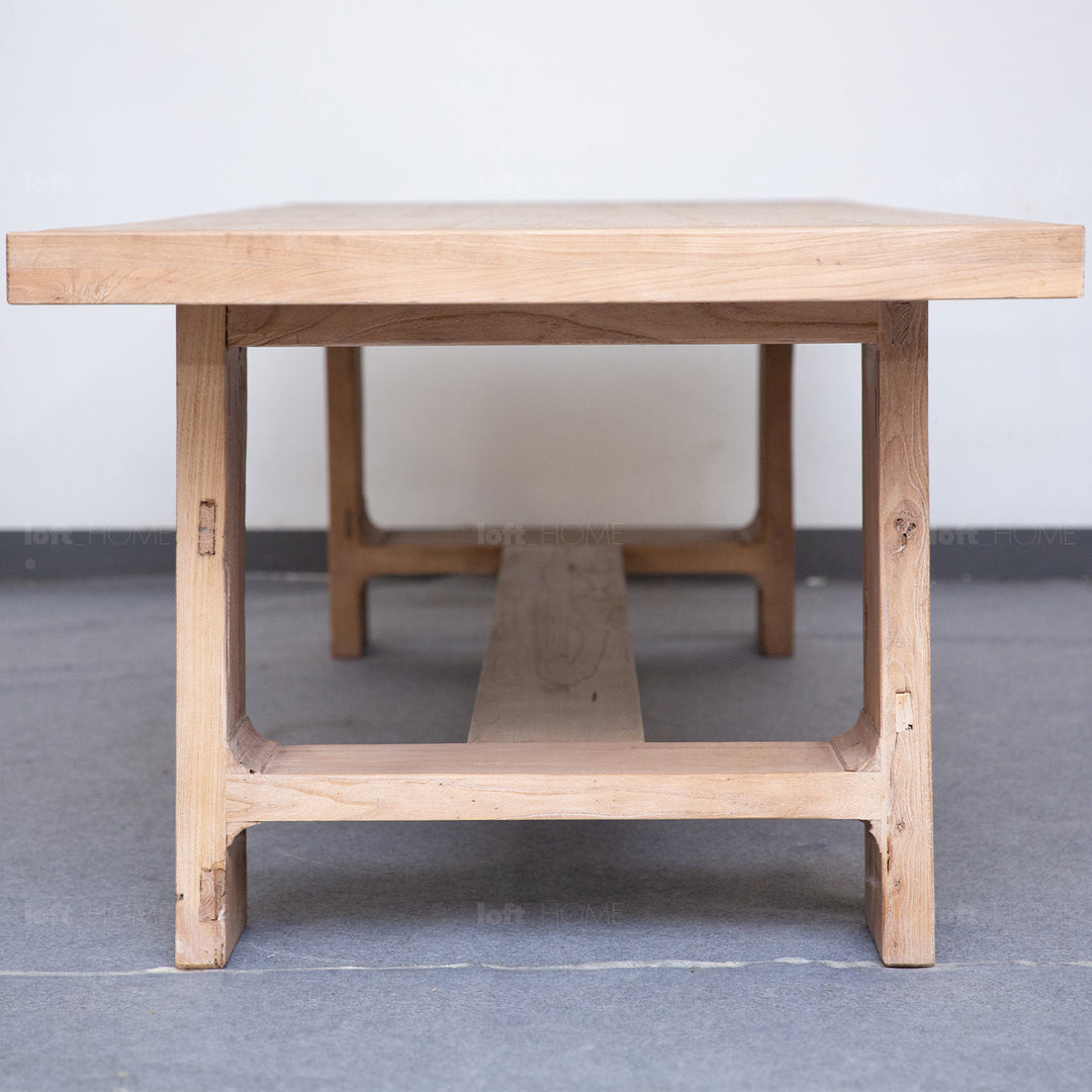 Rustic elm wood dining table forge with context.