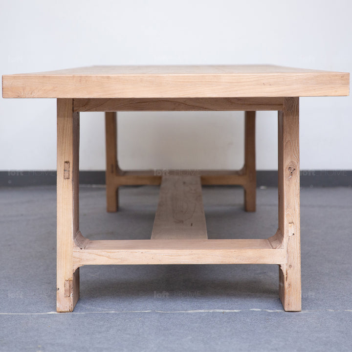 Rustic elm wood dining table forge with context.