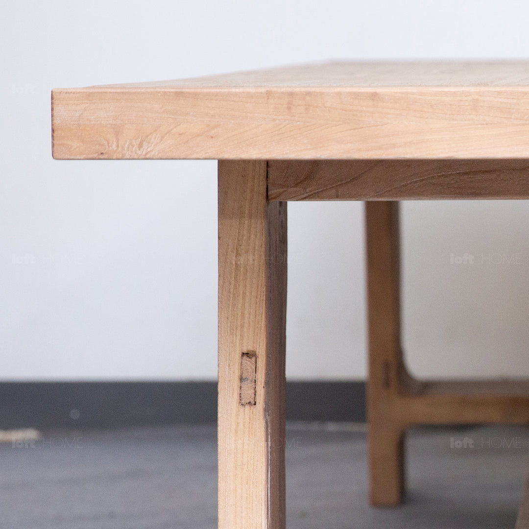 Rustic elm wood dining table forge in details.