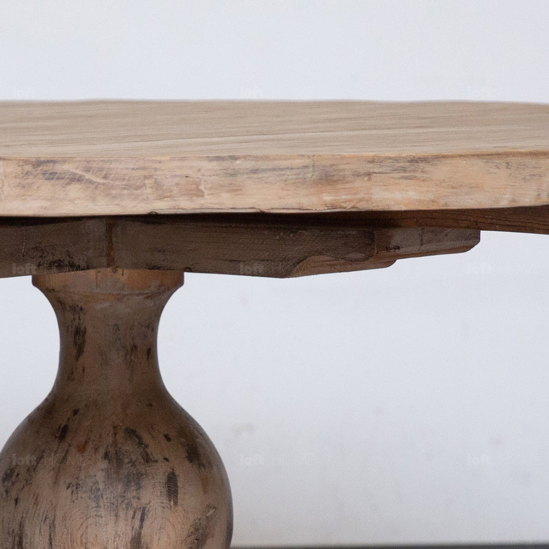 Rustic pine wood round dining table willow in still life.