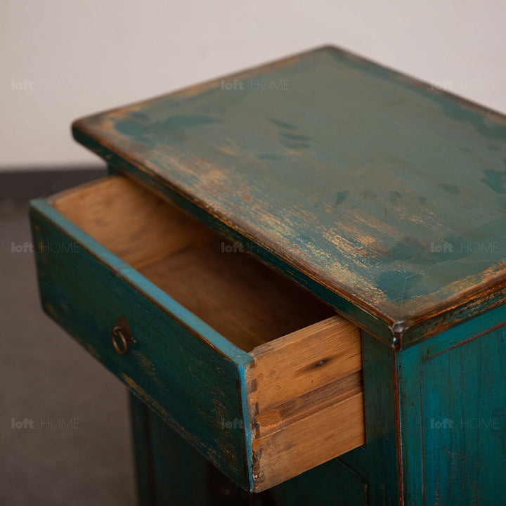 Rustic pine wood side table heirloom with context.