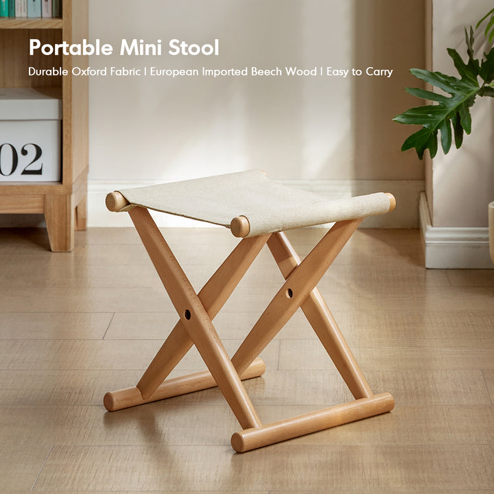 Scandinavian beech wood canvas folding stool kaya in real life style.