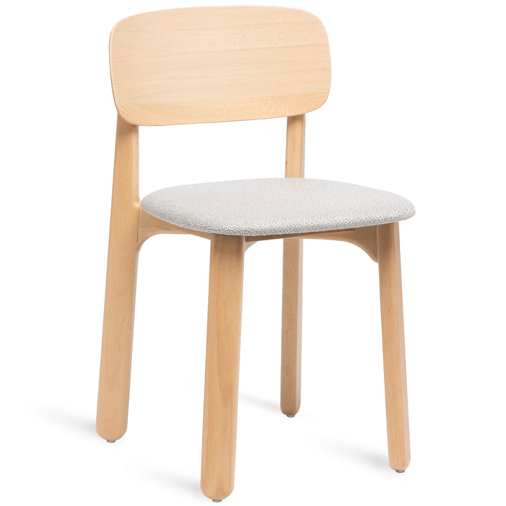 Scandinavian beech wood dining chair poppy s in white background.