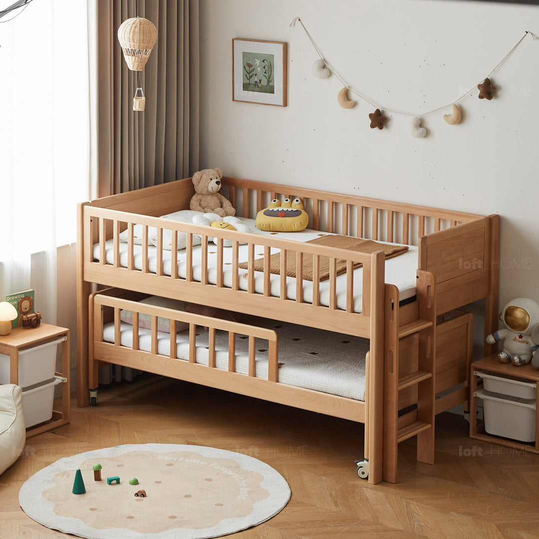 Scandinavian beech wood kids bunk bed with trundle cubble in details.