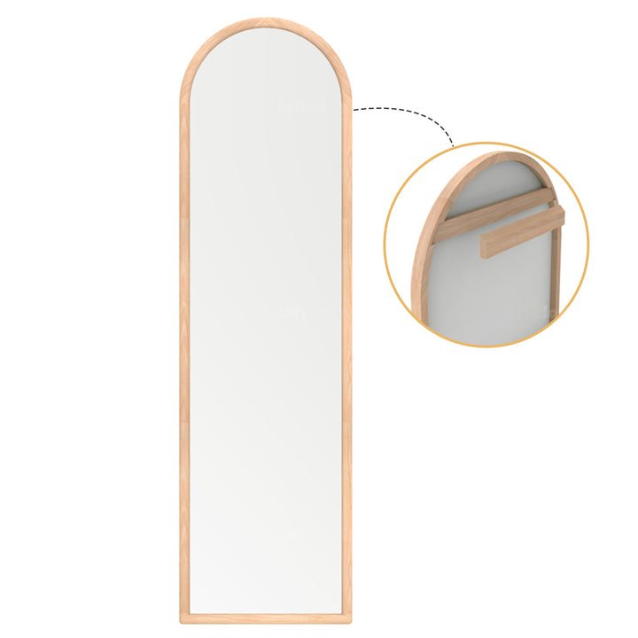 Scandinavian beech wood wall hanging dressing mirror glimmer in close up details.