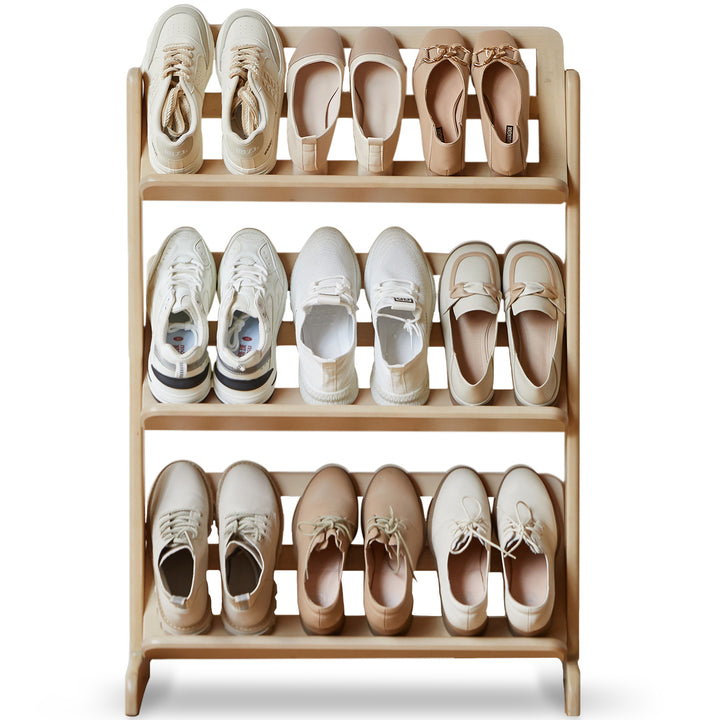 Scandinavian birch wood shoe shelf lina in white background.