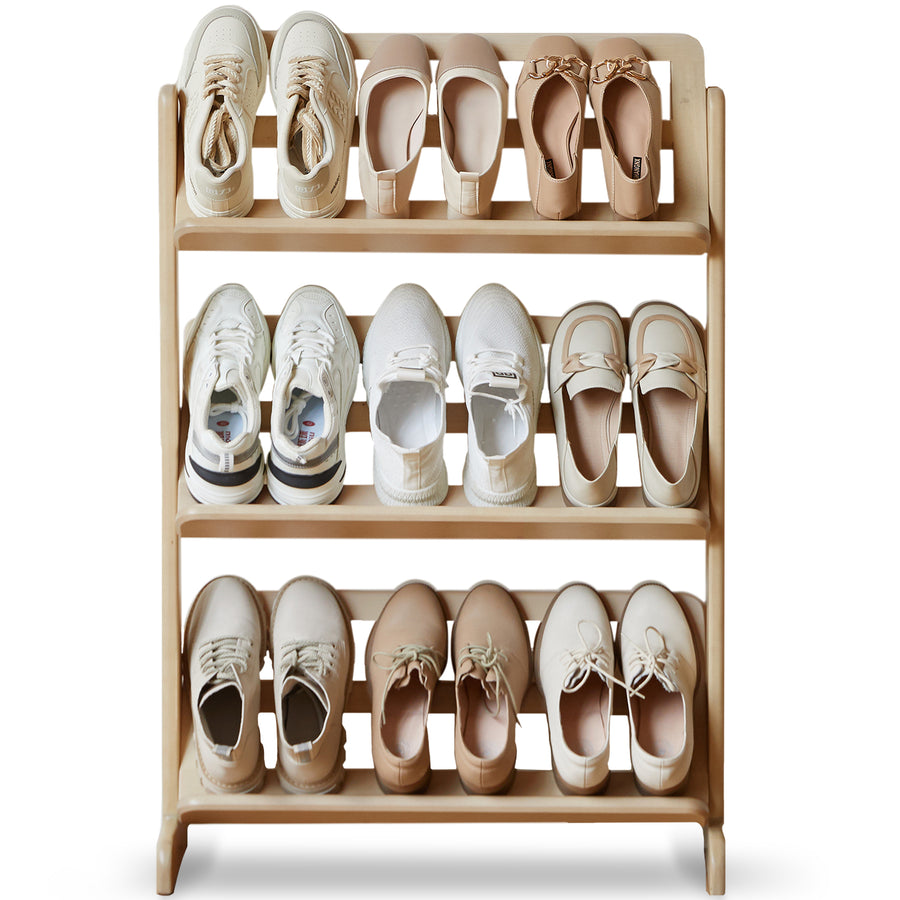 Scandinavian birch wood shoe shelf lina in white background.