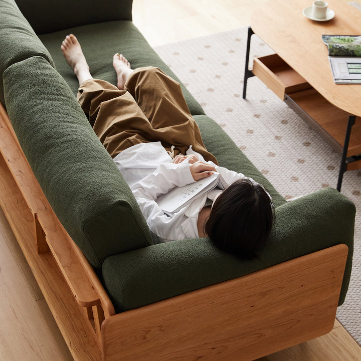 Scandinavian boucle fabric 3 seater sofa harvest with context.