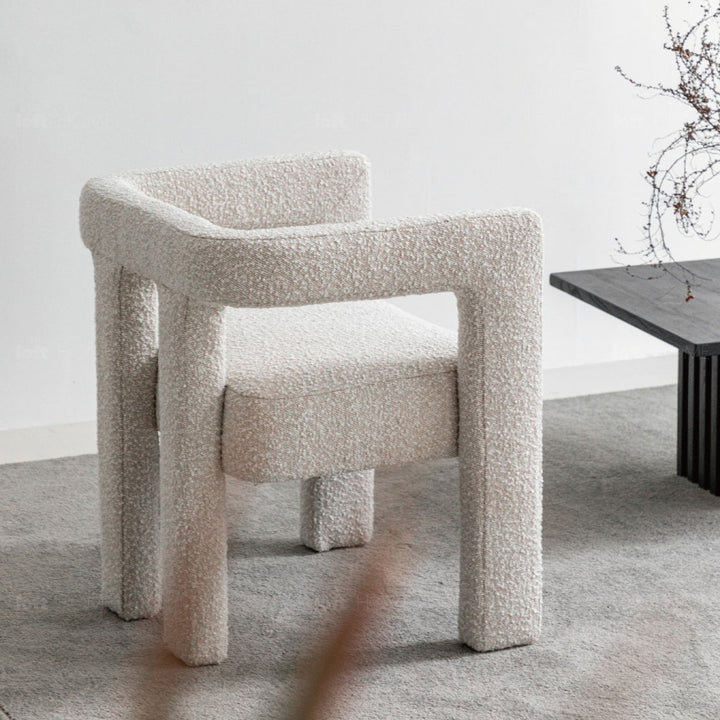 Scandinavian boucle fabric dining chair whim environmental situation.