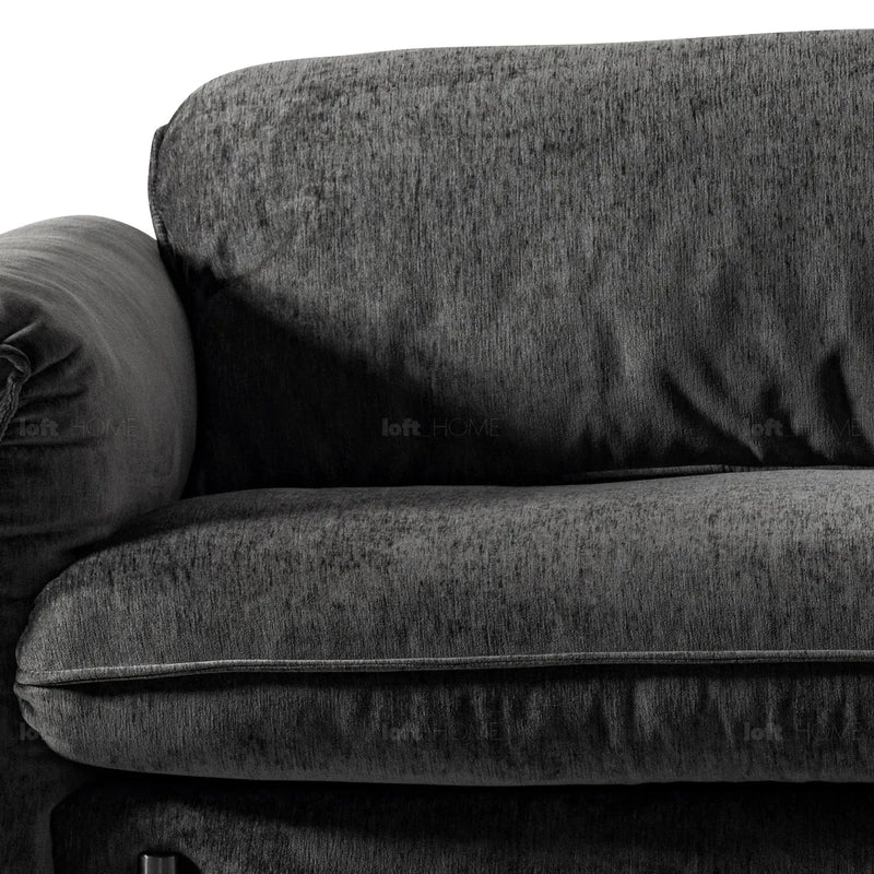 Modern chenille velvet fabric 3 seater sofa dushein in close up details.