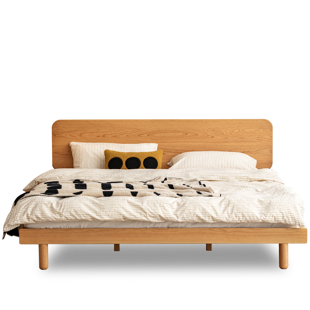 Scandinavian cherry wood bed isle in white background.