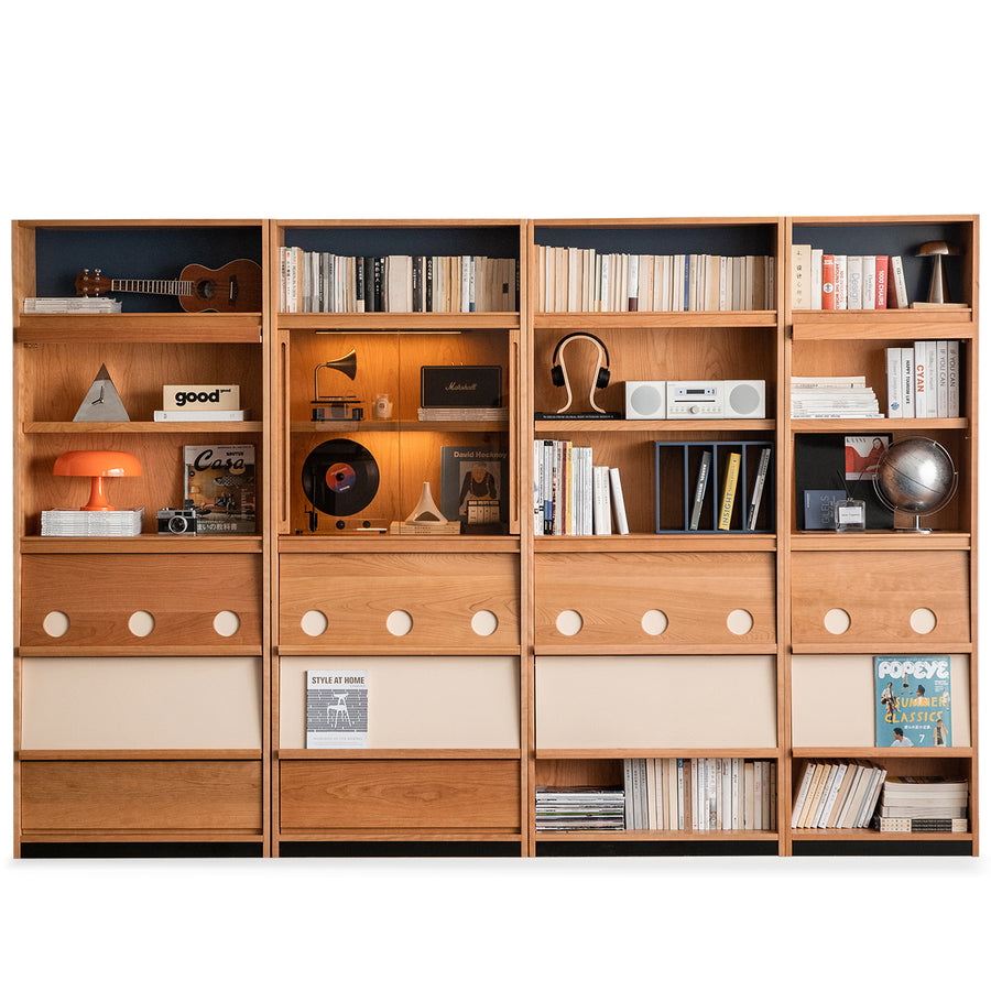 Wooden bookshelf with various items on a white background
