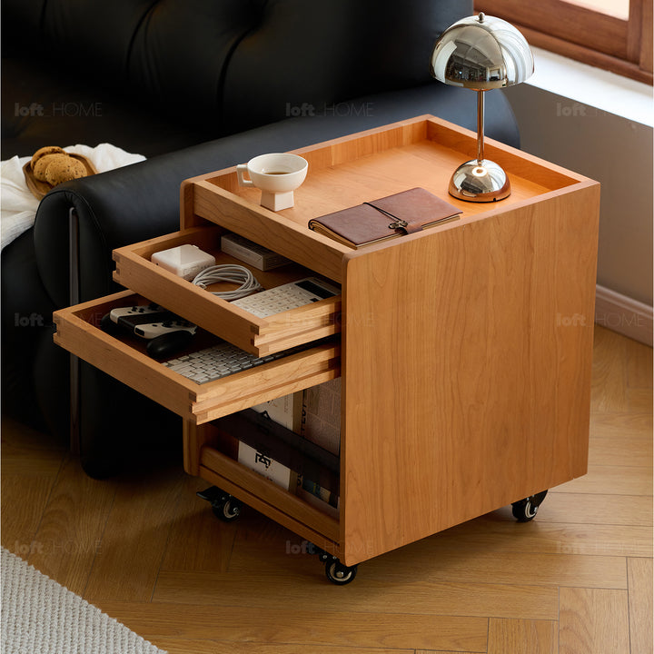 Scandinavian cherry wood sintered stone extendable island dining table with cabinet moonlight with context.