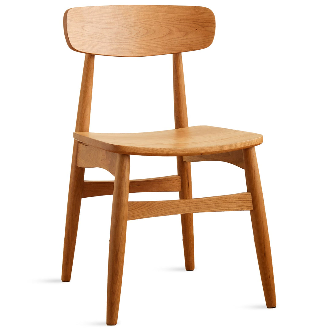 Scandinavian cherry wood dining chair buddy in white background.