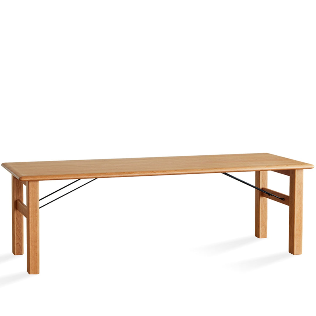 Scandinavian cherry wood dining table haven in white background.