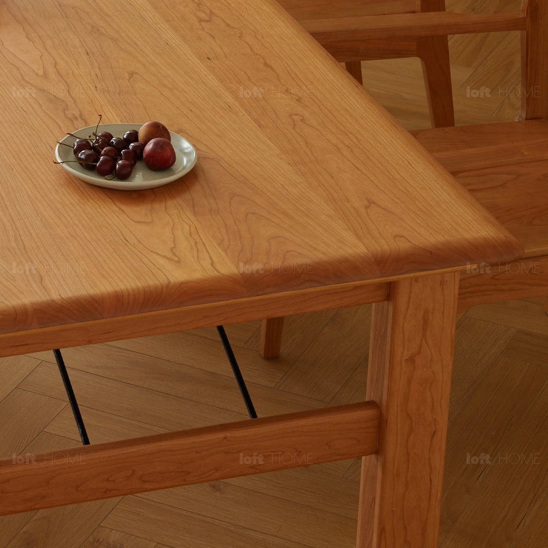 Scandinavian cherry wood dining table haven material variants.