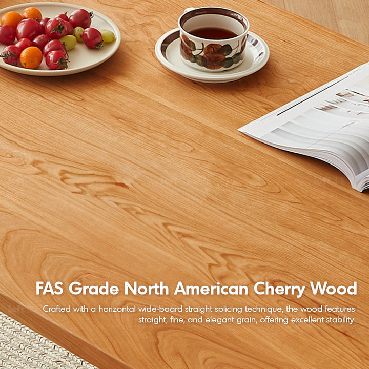 Scandinavian cherry wood dining table kudo in close up details.