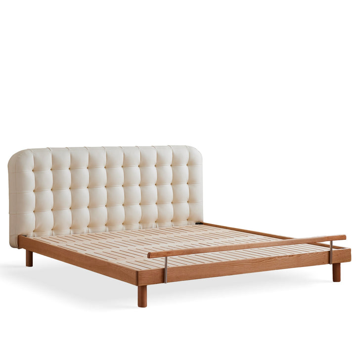 Scandinavian cherry wood leather bed skyline in white background.