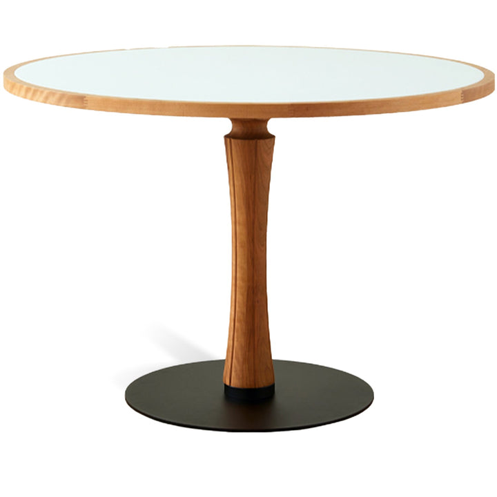 Scandinavian cherry wood sintered stone round dining table fusion in white background.