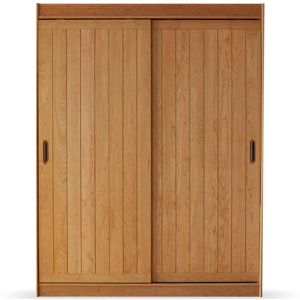Scandinavian cherry wood sliding door wardrobe nava in white background.