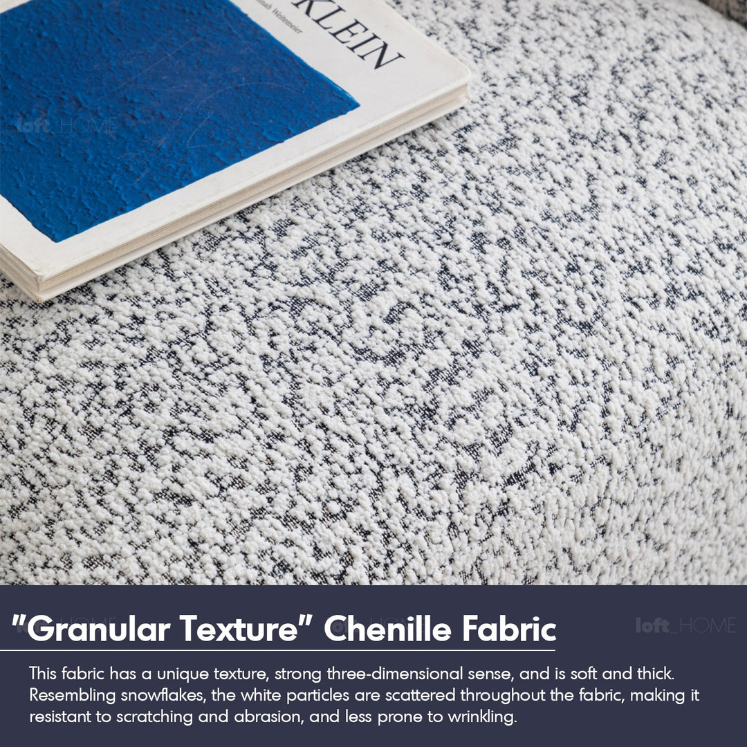 Scandinavian chenille velvet fabric 1 seater sofa embrace in still life.
