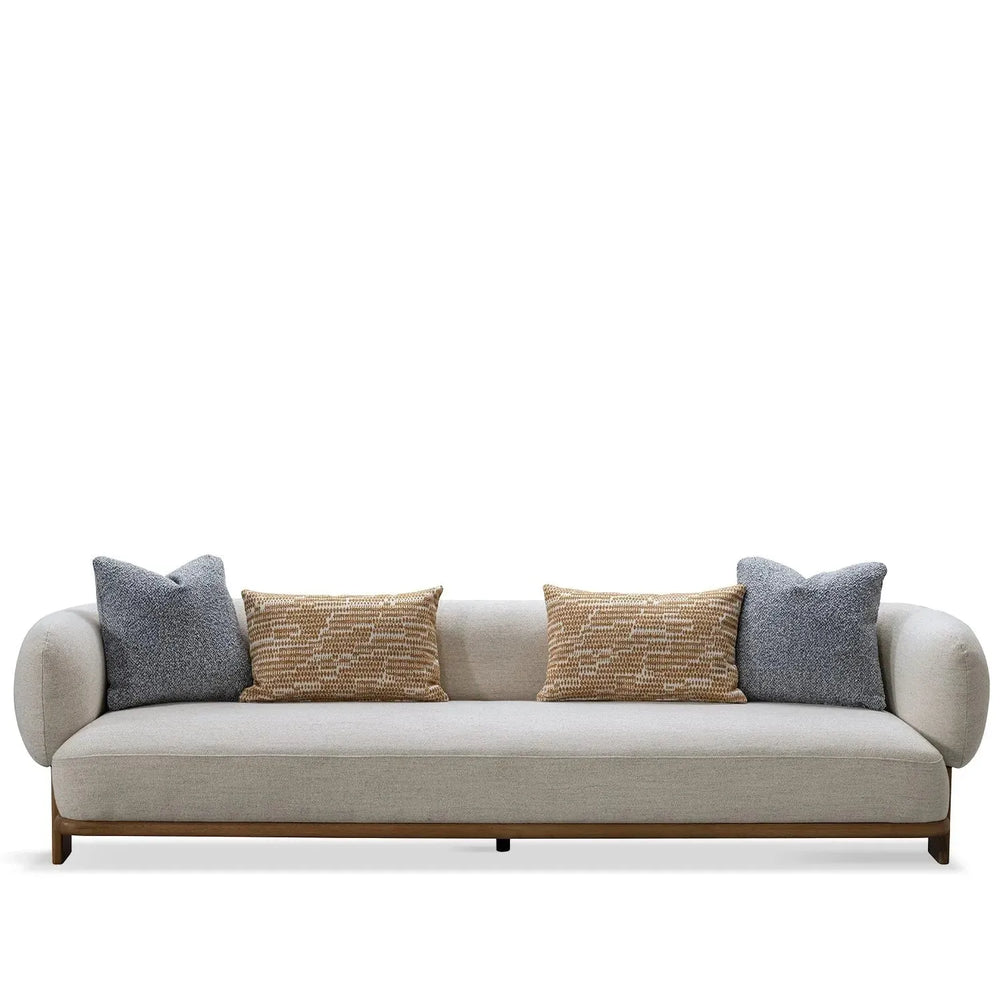 Modern fabric 4 seater sofa waltz in white background.